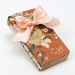 Set de 4 libretas flores 9x17cm. con lazo